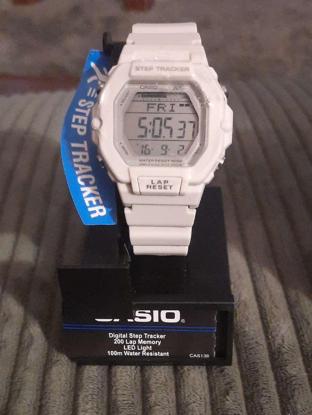 Casio White Digital Step Tracker Watch with Blue Tag